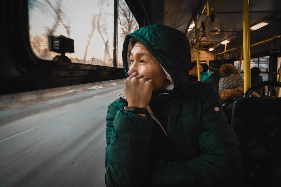 Bus interior looking out at snowy street